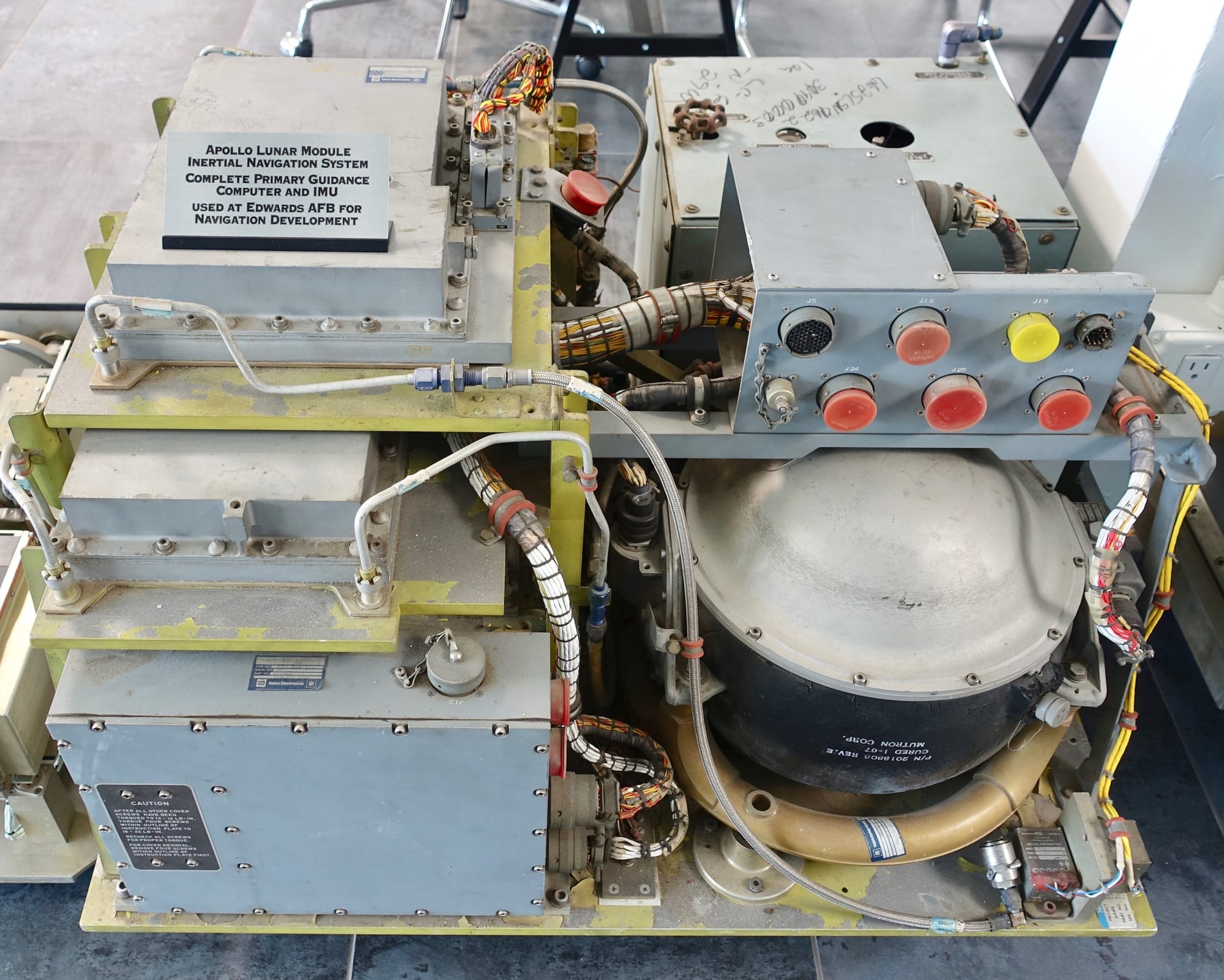 The Apollo Guidance Computer — a compact rectangular unit with circuit boards and keyboard interface — that flew on Apollo 11, on display at the Smithsonian National Air and Space Museum