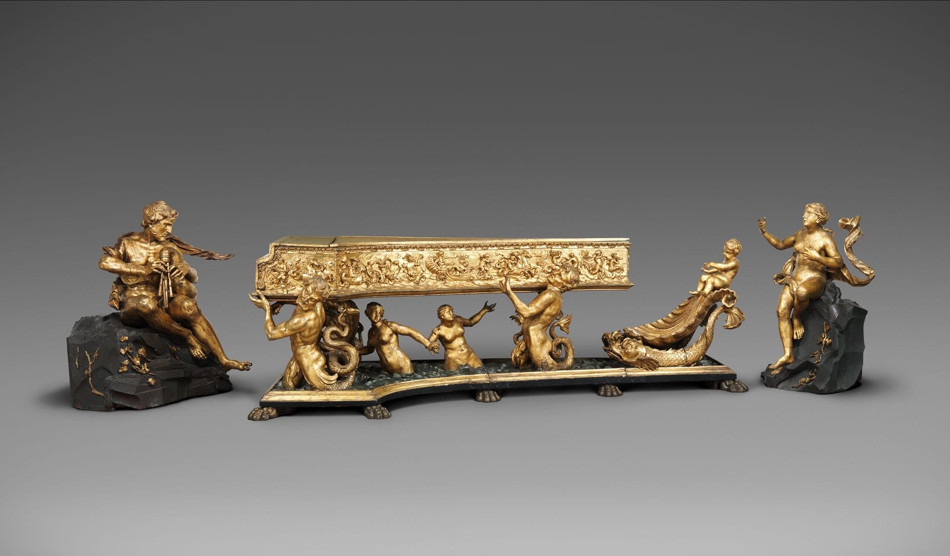 Ornate gilded Baroque harpsichord stand with triton and sea-nymph sculptural figures, Metropolitan Museum of Art