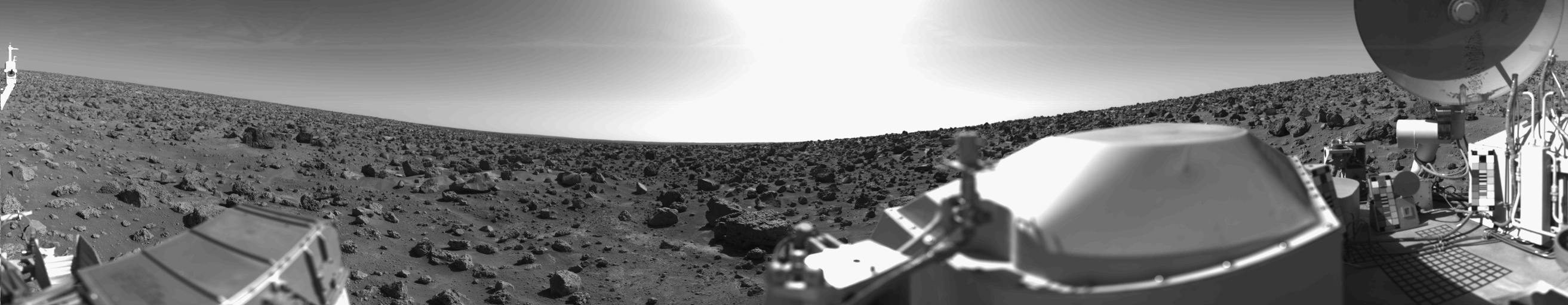 Rocky Mars landscape with boulders extending to the horizon at Utopia Planitia, photographed by Viking Lander 2 on the day of landing, 3 September 1976